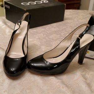 Black patent leather heels strap back